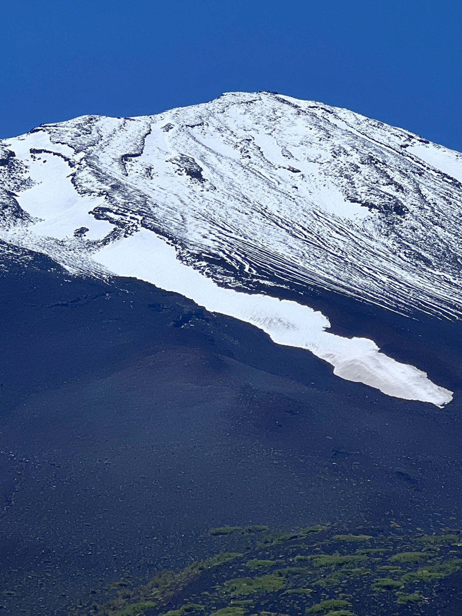 Close-up of the snow-capped summit of Mount Fuji
