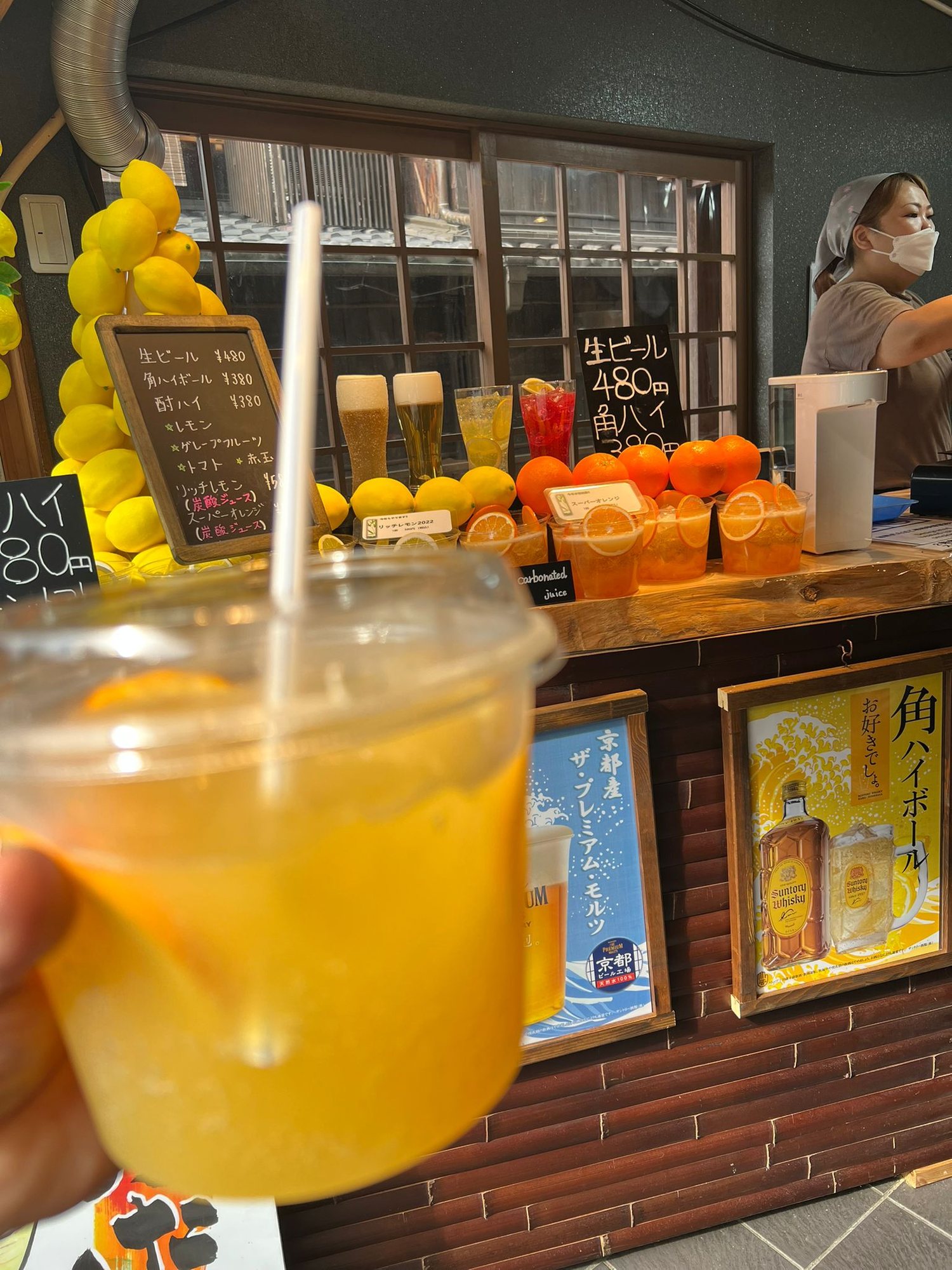 Colourful street food and drink stall in old-town Kyoto market district